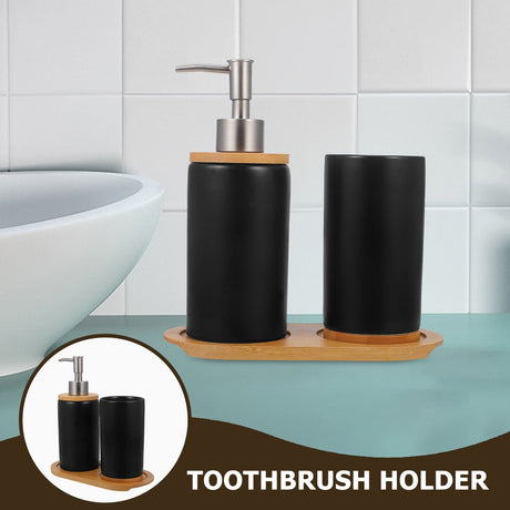 Bathroom countertop set with black dispenser and natural bamboo tray