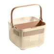 Shower tote upper tier holding shampoo and body wash bottles