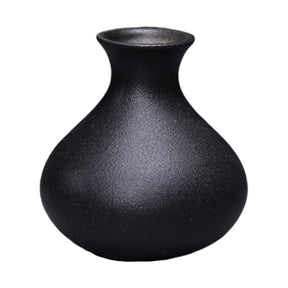 Compact black ceramic table vase with a matte finish