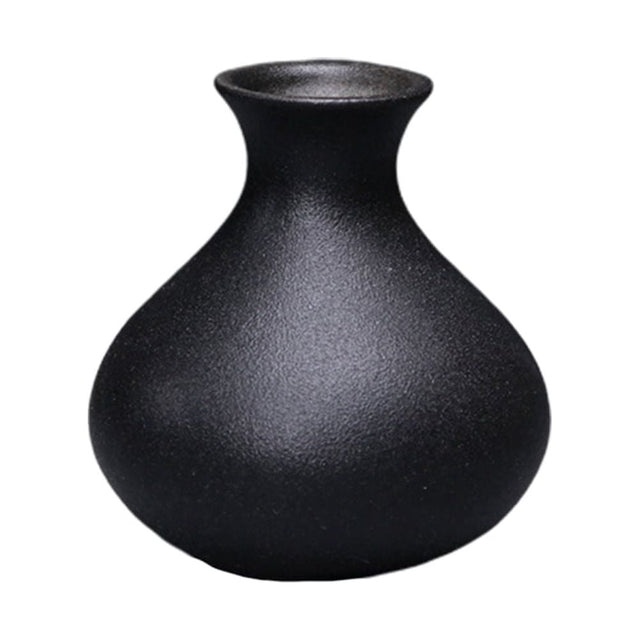 Compact black ceramic table vase with a matte finish