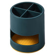 Green plastic toothbrush holder with four compartments on a bathroom countertop