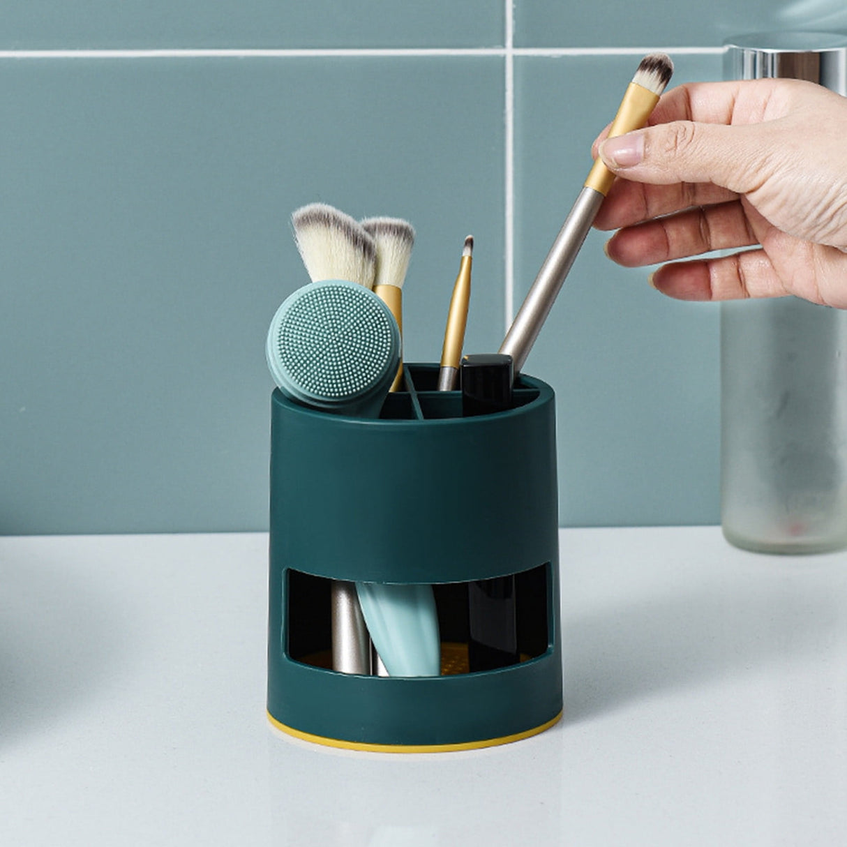 Top view of the four divided compartments in the green toothbrush organiser
