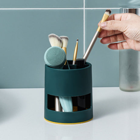 Top view of the four divided compartments in the green toothbrush organiser