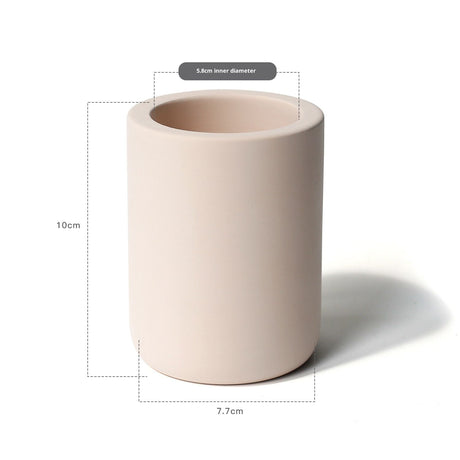 Beige drying stone toothbrush holder shown against a plain background