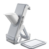 Grey four in one vegetable slicer and dicer with stainless steel blades