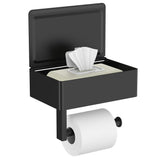 Matte black toilet paper holder with storage shelf mounted on a bathroom wall