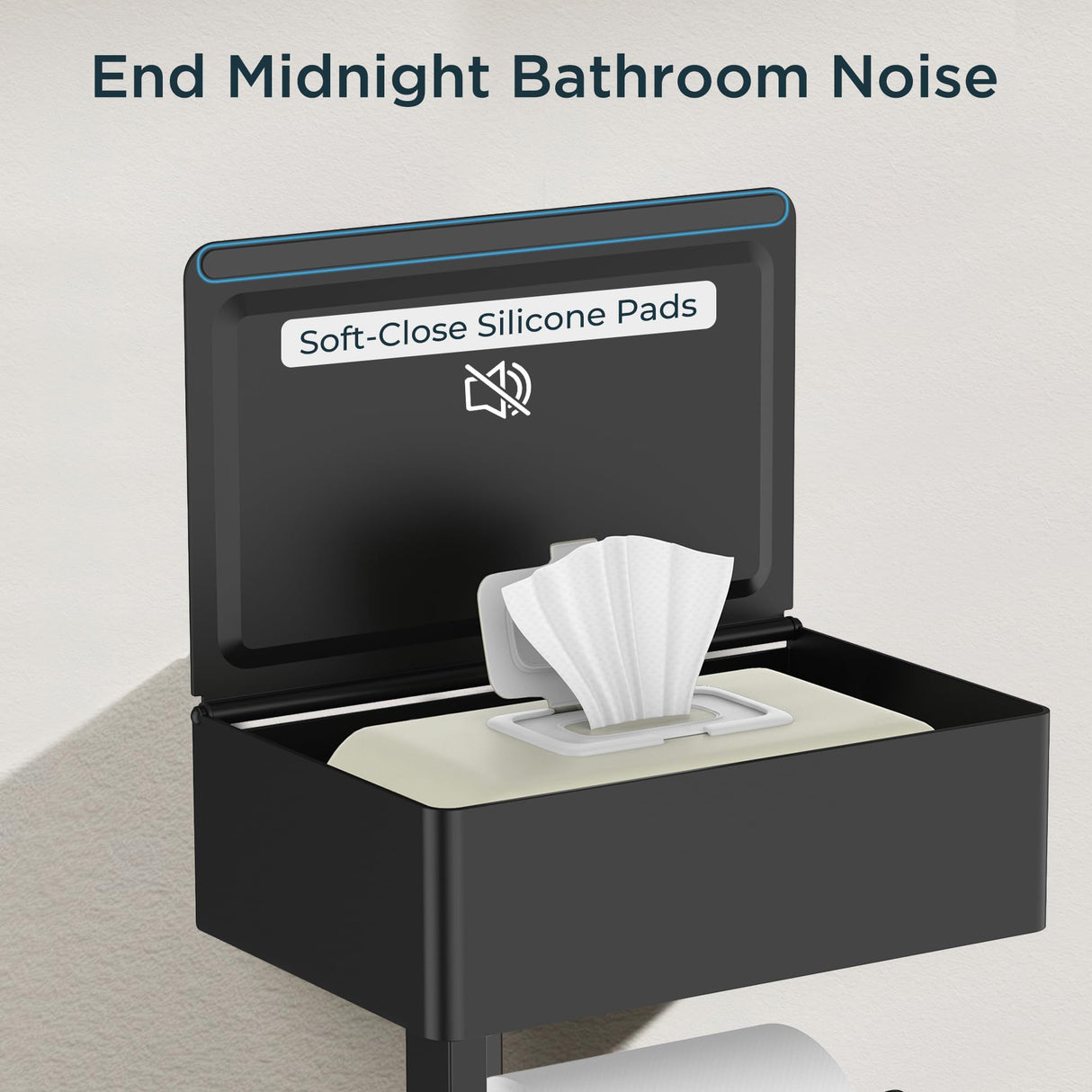 Removable rolling bar detail on the black toilet paper holder