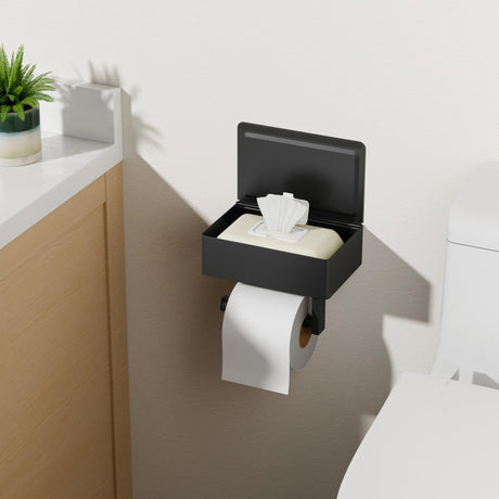 Adhesive mounting stickers being applied behind the toilet roll holder