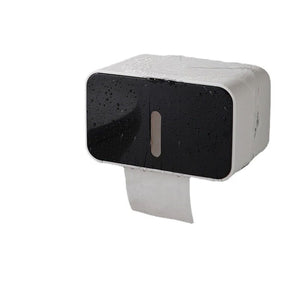 Black enclosed toilet paper holder with full cover mounted on a wall