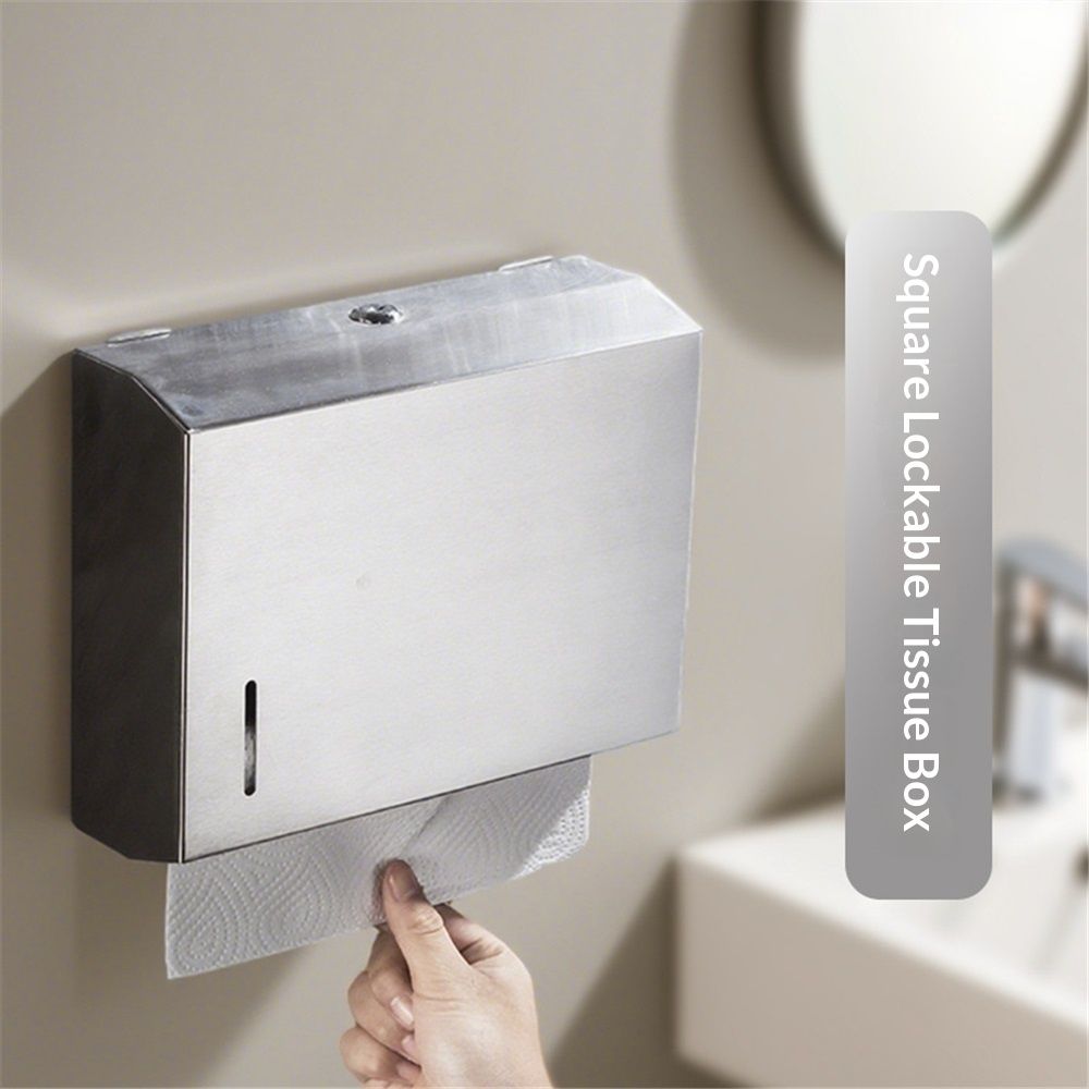 Dispenser cabinet open with the key, showing the paper towel stack