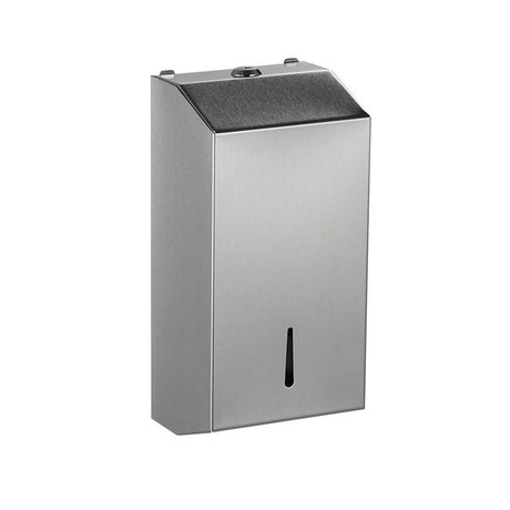 Stainless steel wall mounted paper towel dispenser in a washroom