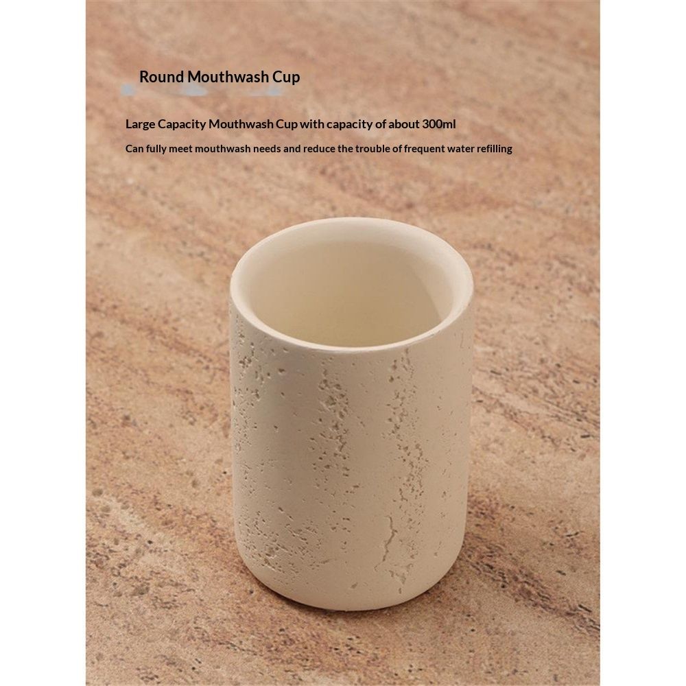 Sandstone cup used as a makeup brush holder on a dressing table