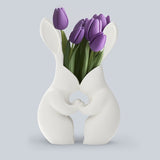 White 3D printed bunny shaped vase with a ceramic look finish