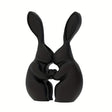Black 3D printed bunny shaped vase with a ceramic look finish