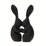Black 3D printed bunny shaped vase with a ceramic look finish