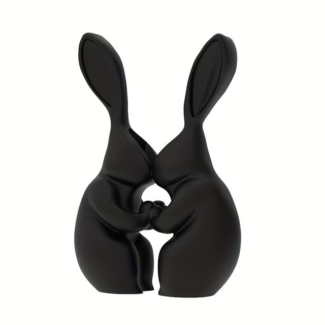 Black 3D printed bunny shaped vase with a ceramic look finish