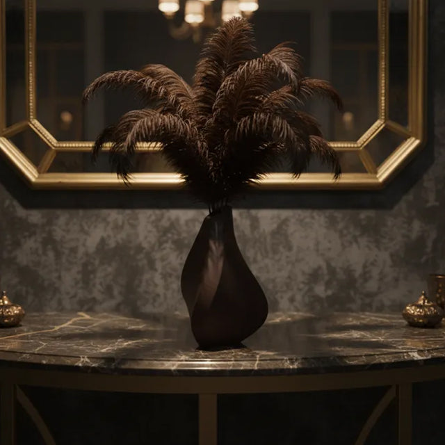 Sculptural black 3D printed vase with a contemplative form