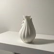 Sculptural white 3D printed vase with an organic spiral form