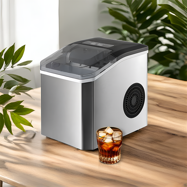 Portable countertop ice maker with carry handle producing bullet ice