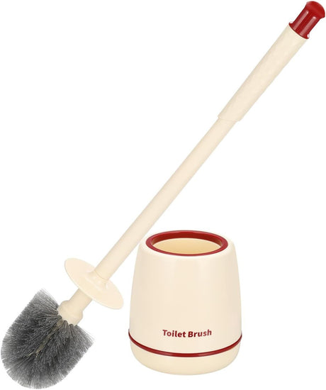 Red toilet brush and holder set standing beside a toilet
