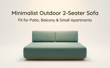 Seaforth timber and fabric two seater outdoor sofa in an outdoor setting