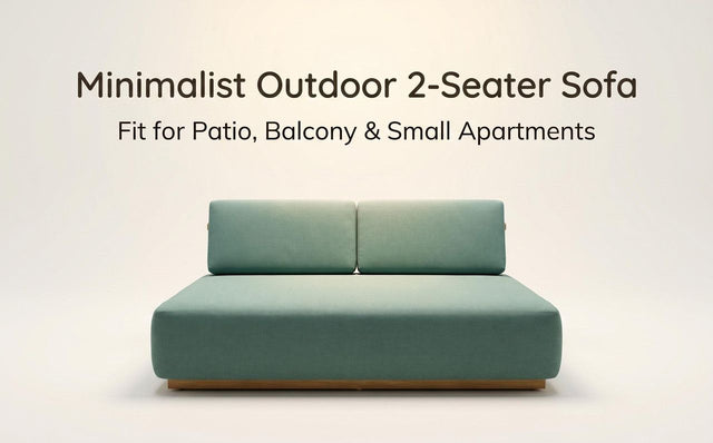 Two seater outdoor sofa in teal fabric on a solid teak frame