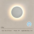 White eclipse LED wall light with touch control