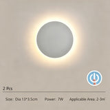 White eclipse LED wall light with touch control
