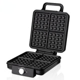 Waffle maker closed on a kitchen bench ready for breakfast