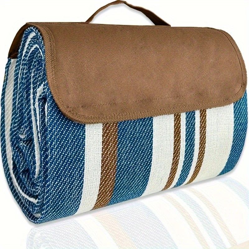 Keswick double layer nylon picnic mat 150 x 200cm laid on grass showing soft woven top and water resistant PEVA base