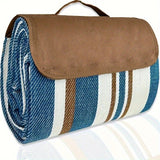 Keswick double layer nylon picnic mat 200 x 200cm laid on grass showing soft woven top and water resistant PEVA base