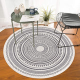 Grey round cotton rug showing Moroccan-style printed pattern