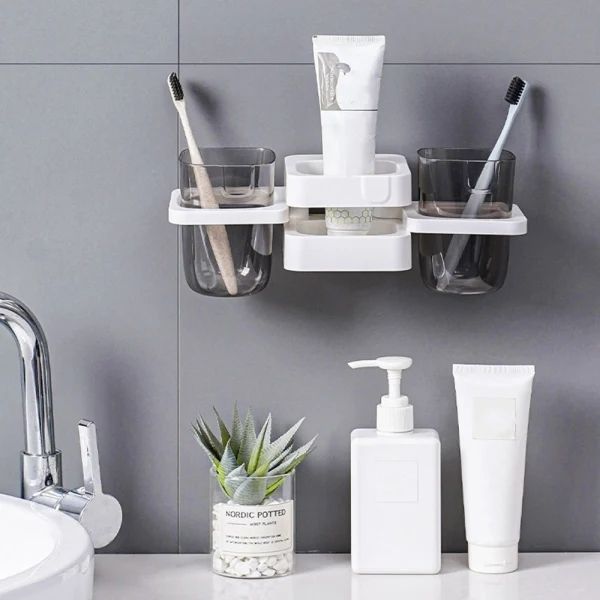 White organiser placed along the back edge of a bathroom basin