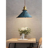 Industrial cage pendant light in blue with brass shell