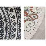 Detail of bohemian mandala round rug showing tassel edge and floral pattern
