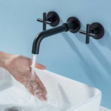 Wall mounted double handle basin mixer tap in matte black