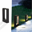 LED outdoor bollard light in black with warm white glow