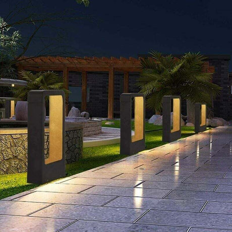 LED outdoor bollard light in black with warm white glow