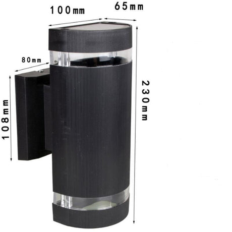 Black up and down outdoor wall light on an exterior wall