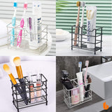 Black stainless steel toothbrush stand holding a razor and comb beside a basin