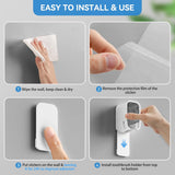 Toothbrush holder detached from its adhesive strip for rinsing
