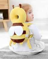 Toddler wearing padded head protector backpack