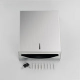 Paper towel dispenser mounted on a washroom wall above a basin