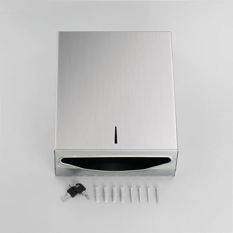Paper towel dispenser mounted on a washroom wall above a basin
