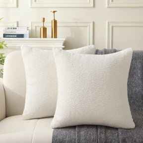 Hamilton white boucle textured square throw cushions set of two on a sofa