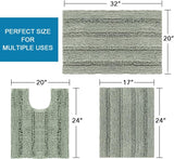 Large sage striped chenille bath mat, 51 x 81 cm, in front of a bath tub