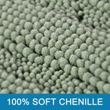 U shaped sage striped chenille rug fitted around the base of a toilet