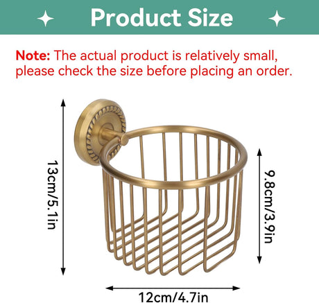 Brass roll holder mounted on a bathroom wall beside a toilet
