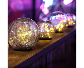 Solar crack glass ball garden light glowing warm white