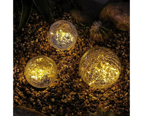 Solar crack glass ball garden light glowing warm white